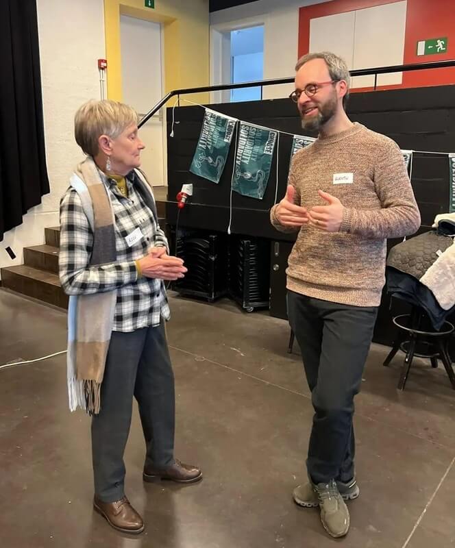 Quentin, regiocoördinator West-Vlaanderen, tijdens het Netwerkmoment in Brugge